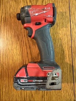 Milwaukee M18 fuel impact driver with 2.0 battery