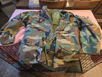 Vintage US Army M-65 field jacket in woodland camouflage.