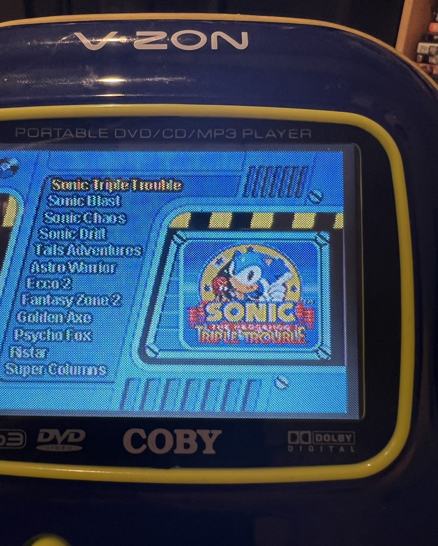 Vintage Coby V-ZON portable DVD player and Retro Game Player for