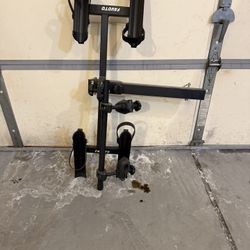 Two Bicycle Carriers, One Trunk Mount Or Hatchback. One Receiver Hitch Mount Both Like New Never Used 50$or best offer