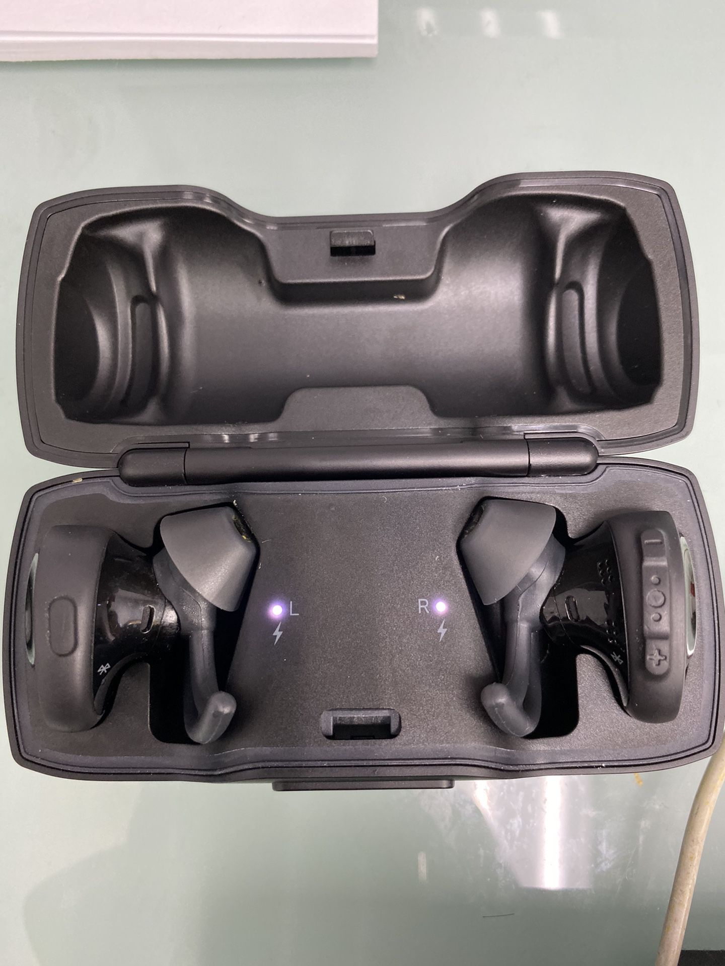 Used Bose sound sport free wireless earbuds with original packaging and charging cable