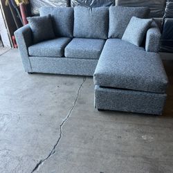 Grey Small Sectional With Reversible Chase 