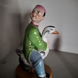 About 7" Tall Boy Riding A Goose 