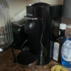 Nespresso machine missing lid to water basin still works great