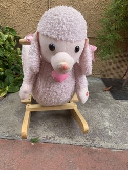Pink poodle rocking chair