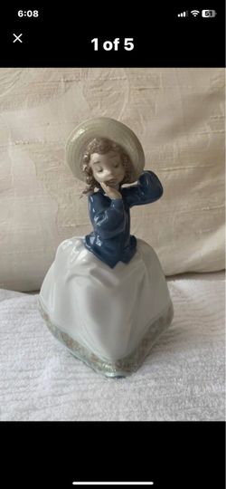 Lladro Nao child with flower