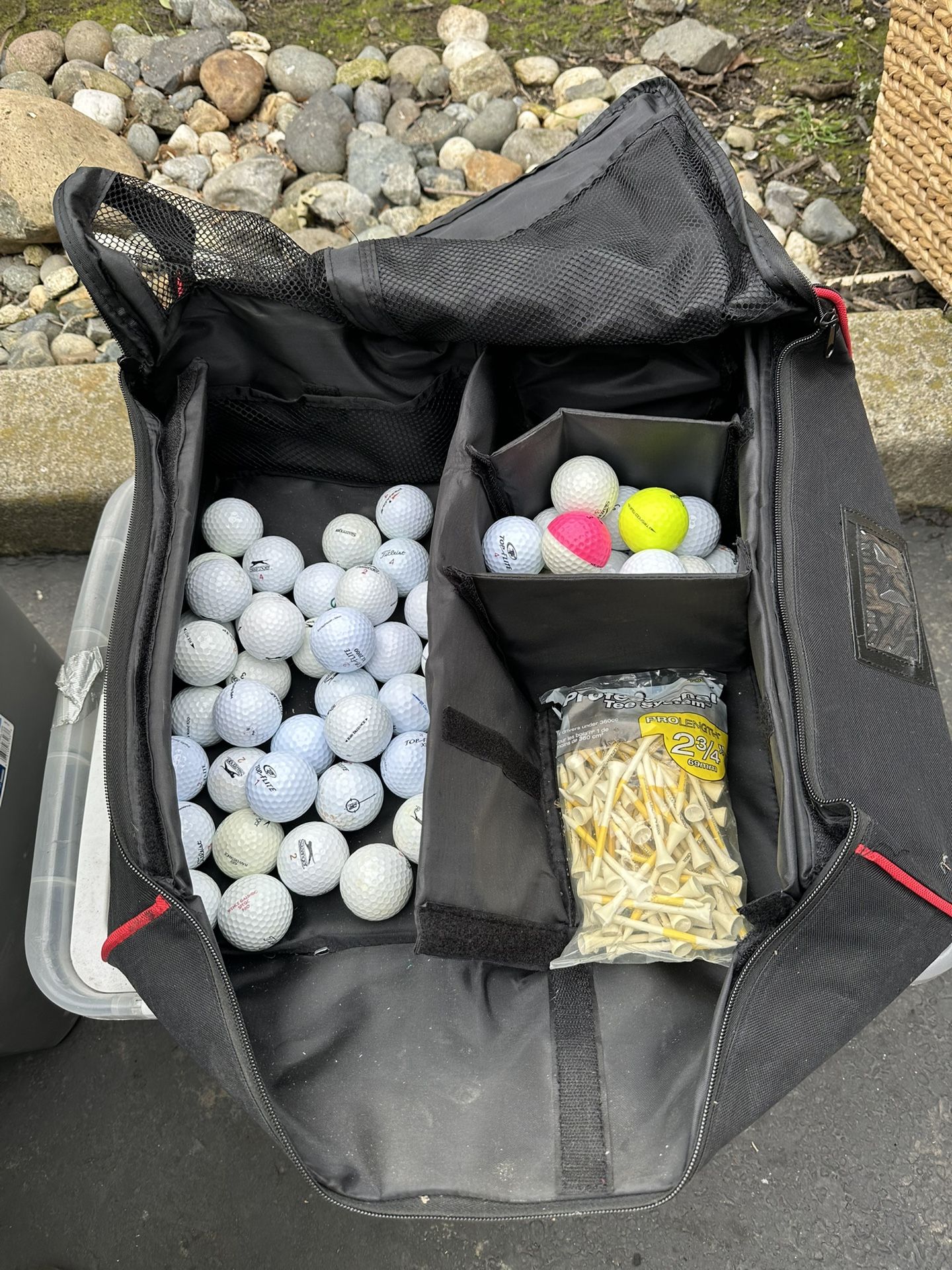 bag with 58 golf balls and other items