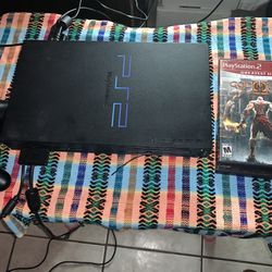 PLAYSTATION 2 SYSTEM WITH 2 GAMES 