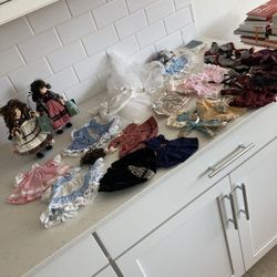 Two Madame Alexander Dolls And Clothes