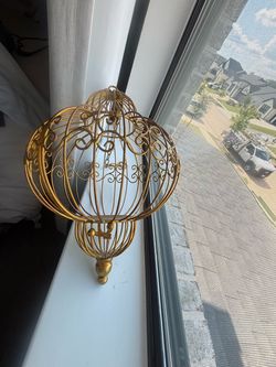 Gold bird cage hanger