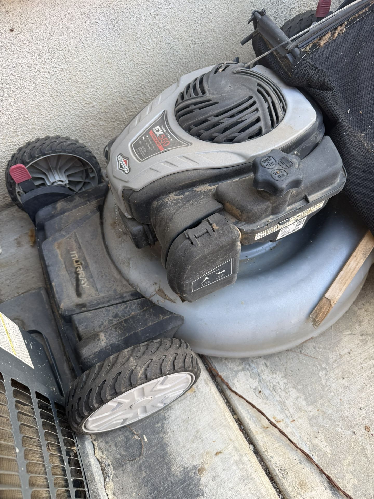 Briggs and Stratton Walk Behind Gas Push Lawn Mower with Height Adjustment and with Mulch Bag