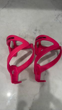 Supercaz- 2 bright pink water bottle cages- front entry
