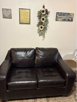 Brown Faux leather loveseat