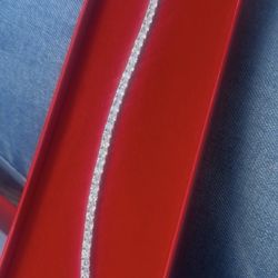 Brand new 10 Karat white gold tennis bracelet