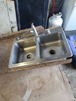 STAINLESS STEEL SINK/W DISPOSAL