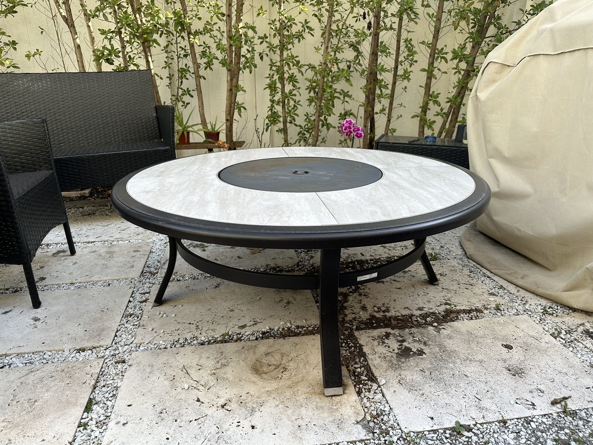Hampton Bay Whitfield 48 in. Round Galvanized Steel Wood Burning Fire Pit Table in Dark Brown with Stone Look Tile Top