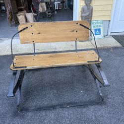  Beautiful antique bench believed to be from a late 19th or early 20th-century horse-drawn carriage or sleigh. This unique piece features a solid blac