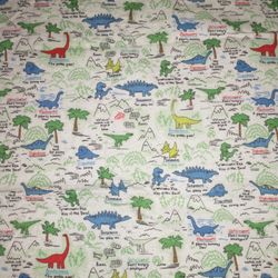 White flannel feeling dinosaur fabric 36.5" by 44" 