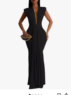 Elegant, form-fitting sleeveless maxi dress for women featuring a deep V-neck, draped front, twist-waist detail, and shoulder pads; a mermaid-style co