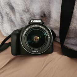 Canon EOS Rebel T100 Digital SLR Camera with 18-55mm Lens Kit, 18 Megapixel Sensor