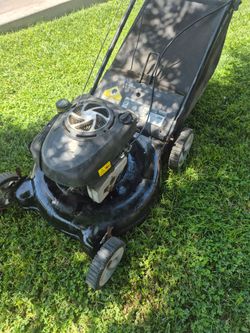 Older push lawn mower starts right up