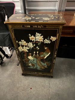 Ornate chinese cabinet