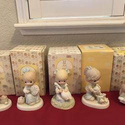 A group of 5 Vintage Precious Moments figurines