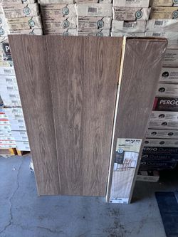 TrafficMaster Sweetwater Oak 7 mm x 7.6 in. W Laminate Wood Flooring