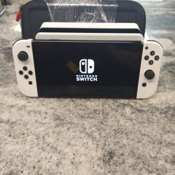 Nintendo Switch OLED White In Color With Case