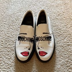 Moschino face-print slip-on loafers