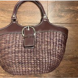  Brown woven hand bag. New, no tags. Perfect for all seasons.