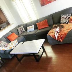 Dark grey sectional couch