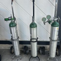 3 M24 Oxygen Cylinders /tank, Bundle All For 100.   Come With Carts And 2 Regulators . 