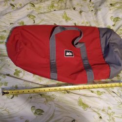 REI Roadtripper duffle bag medium red gray