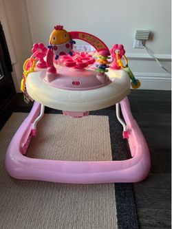 Pink baby walker used in good condition