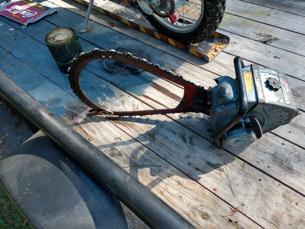 "HOMELITE CHAINSAW W/BOW SAW"