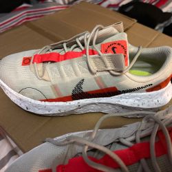Size 9 men’s Nike Crater Impact running shoes in a Light Bone and Bright Crimson colorway. 40$ excellent condition