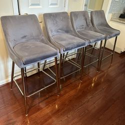Gold and Gray Counter height chair. Can deliver ($95 each)