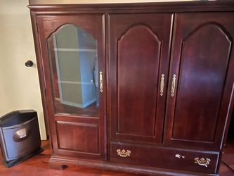 Dark cherry TV/stereo cabinet