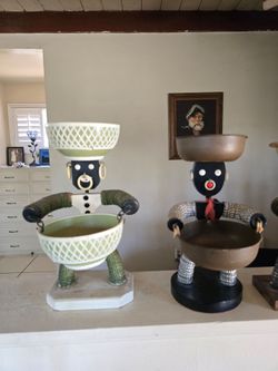 Folk art statues.