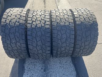 (4) 33x12.50R18 Toyo All Terrain 