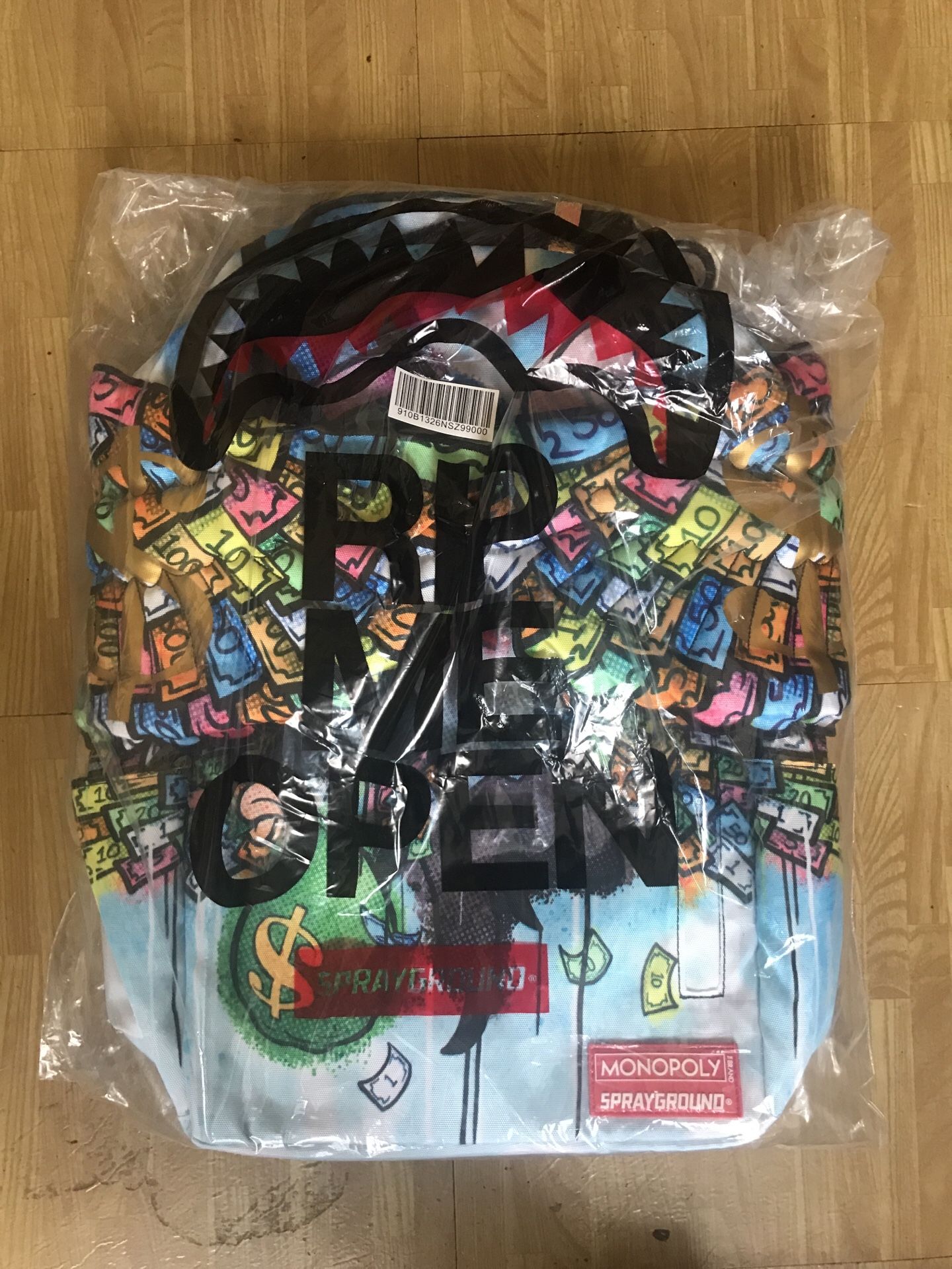 Sprayground monopoly cheap wings