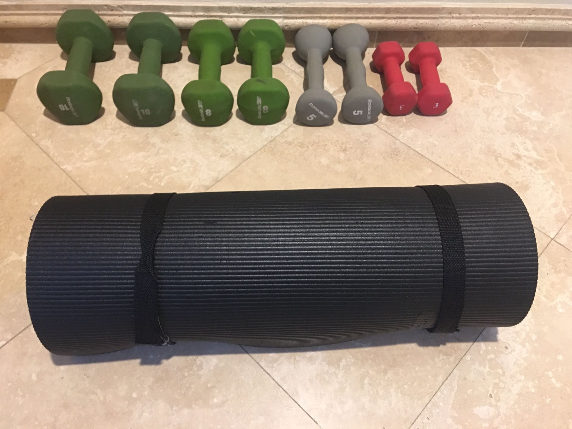 Set of weights and exercise mat