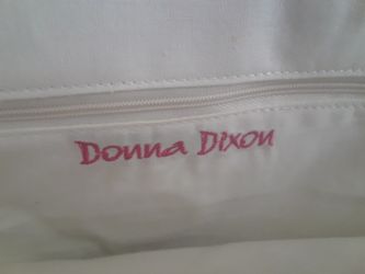 Clutch purse by Donna Dixon and small cosmetic bag