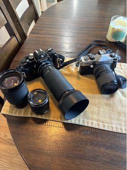 Nikon and Praktica cameras lenses good