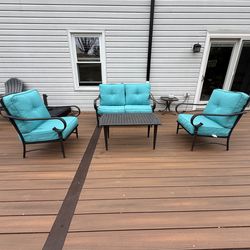 4-person outdoor chat set with SUNBRELLA cushions