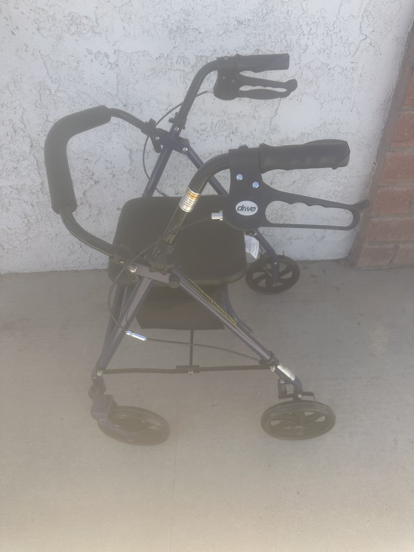 Drive Walker With a Seat