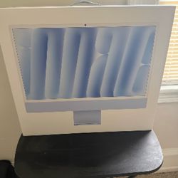 Apple desk top computer blue