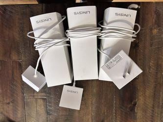 Linksys Mesh Router System With Additional Arris Surfboard Modem.