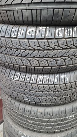 205 60 16 (2) HIGH TREAD all season used tires FREE installation and balance